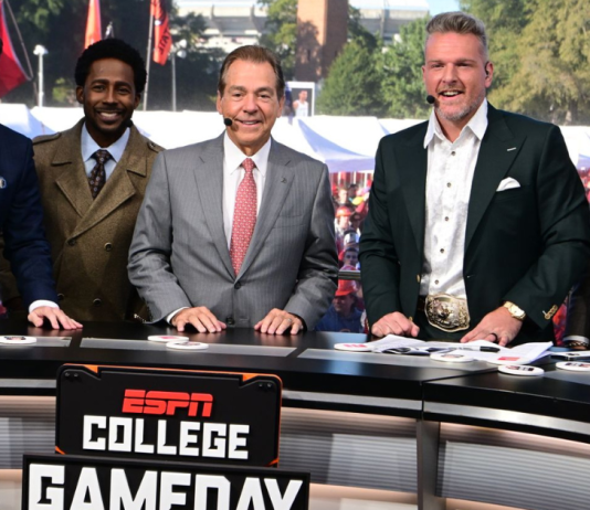 Pitt vs ND, Georgia vs Texas, USF at Navy — Where to Watch-Alt Text: Nick Saban smiling on the ESPN College GameDay set in Tuscaloosa, wearing a suit and headset.